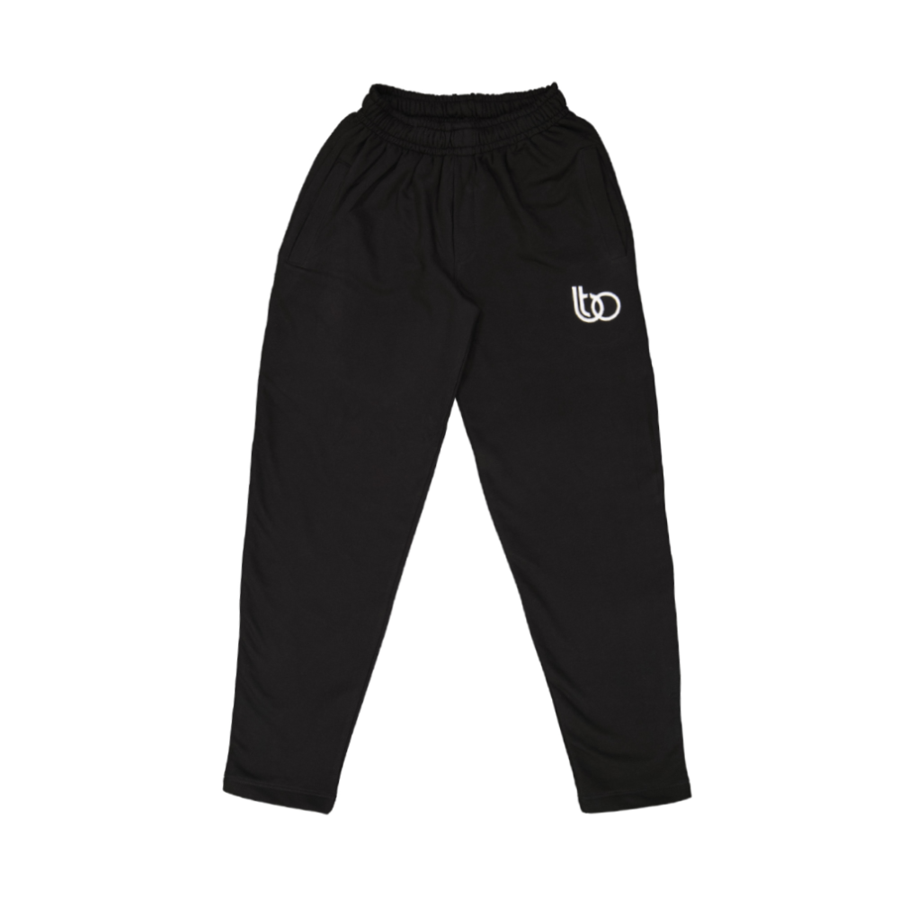 A pair of black pants with a white BIGTYNSONLY logo on the upper thigh.