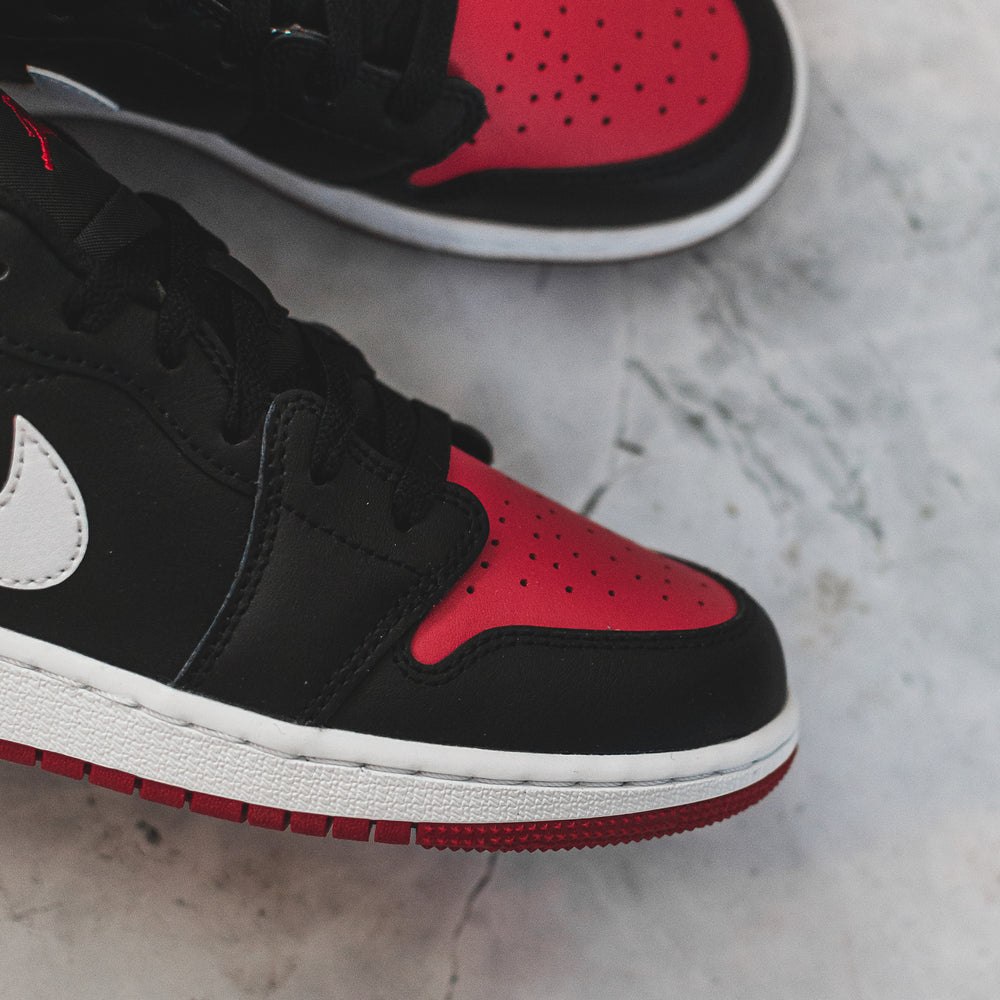 Jordan 1 Low Alternate Bred Toe (GS) – Swest Kicks