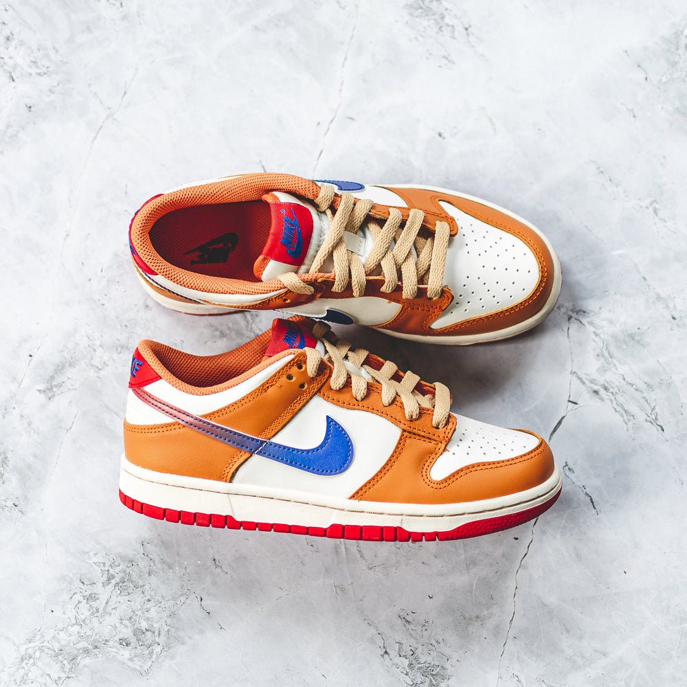 Nike low swoosh best sale