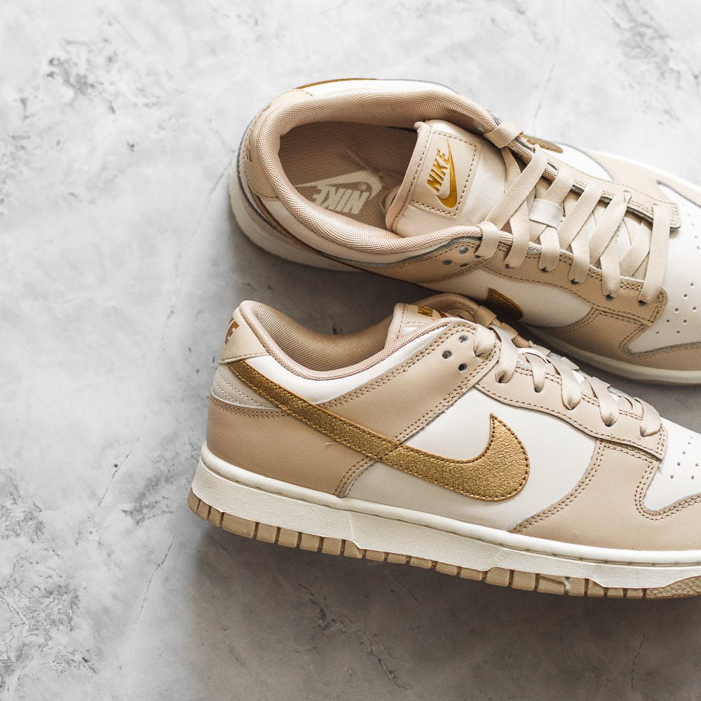 nike sb dunk low metallic gold